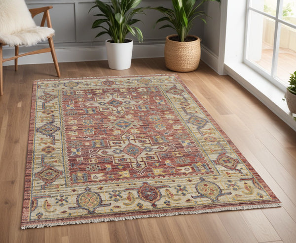 Homeroots 4' X 6' Ivory Red And Gold Wool Oriental Hand Knotted Area Rug With Fringe Red Wool 567145