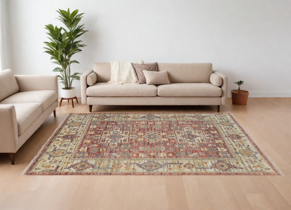 Homeroots 9' X 12' Ivory Red And Gold Wool Oriental Hand Knotted Area Rug With Fringe Red Wool 567148