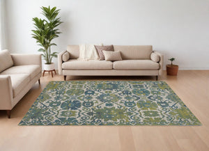 HomeRoots 10' Blue and Green Oriental Area Rug – Timeless Elegance, Durable, Easy-Care for Family Spaces 10' X 13' 567168