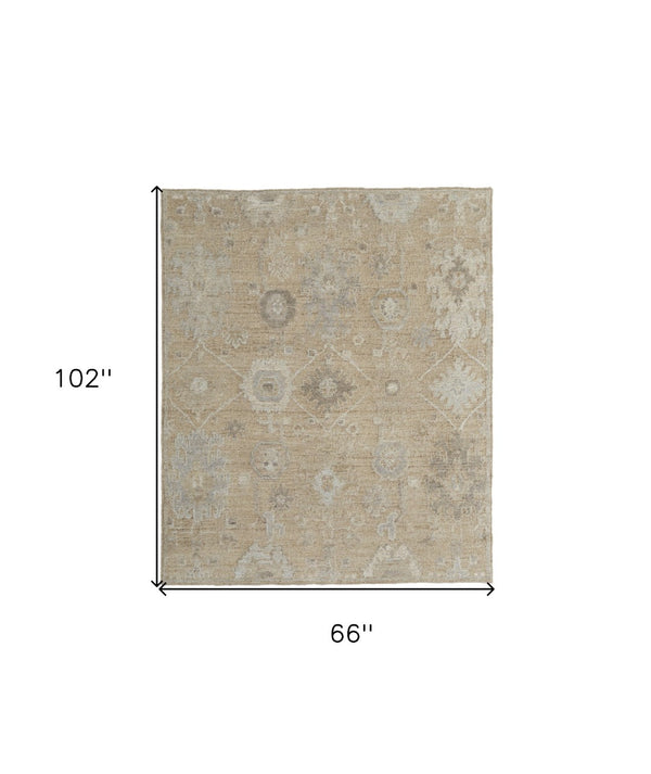 HomeRoots 4' Luxurious Tan and Ivory Floral Hand-Knotted Wool Area Rug for Warmth and Timeless Elegance 6' X 9' 567176
