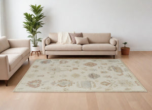HomeRoots 6' Hand-Knotted Wool Floral Area Rug in Ivory, Tan, and Gray for Timeless Elegance and Durability 8' X 10' 567190