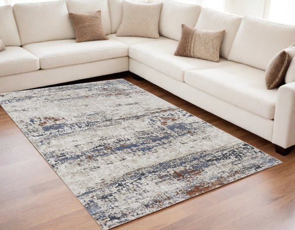 HomeRoots 5' Modern Gray Blue and Ivory Abstract Power Loom Area Rug for Elegant Living Spaces and Comfort 5' X 8' 567213