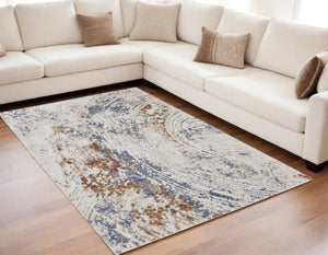 HomeRoots 5' Abstract Ivory Blue and Brown Area Rug – Modern Power Loom Design for Effortless Home Style 5' X 8' 567218