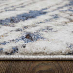 HomeRoots 5' Abstract Ivory Blue and Brown Area Rug – Modern Power Loom Design for Effortless Home Style 8' Runner 567221