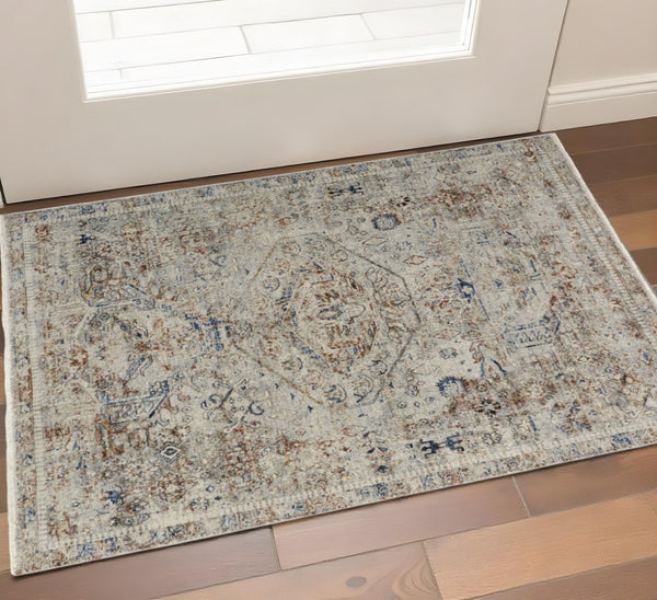 HomeRoots 3' Elegant Blue Tan and Red Distressed Oriental Area Rug with Tasseled Fringe for Vintage Charm 3' X 5' 567238