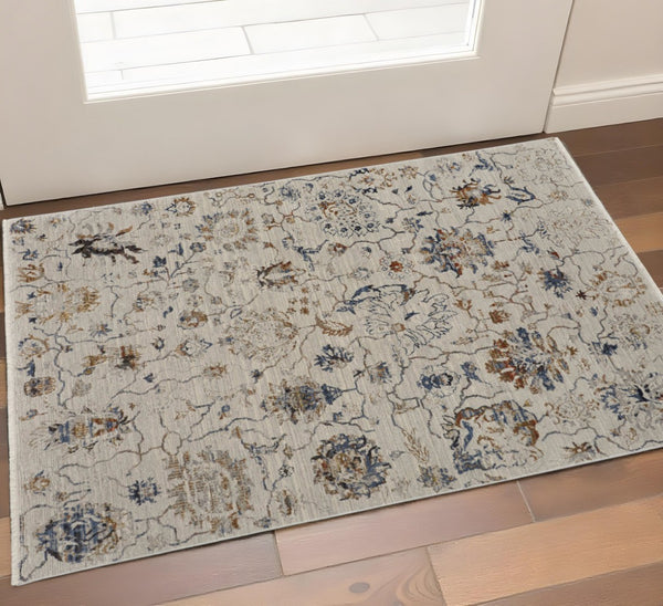 HomeRoots 3' Vintage-Inspired Floral Area Rug with Distressed Design and Tasseled Fringe for Timeless Charm 3' X 5' 567258