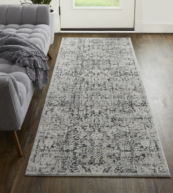 Homeroots 12' Ivory And Gray Abstract Power Loom Worn Faded Runner Rug With Fringe Ivory Polypropylene 567272