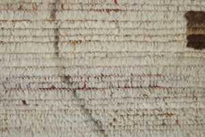 HomeRoots 6' X 9' Ivory and Tan Hand-Knotted Wool Moroccan Area Rug - Timeless Elegance for Any Space! 567289