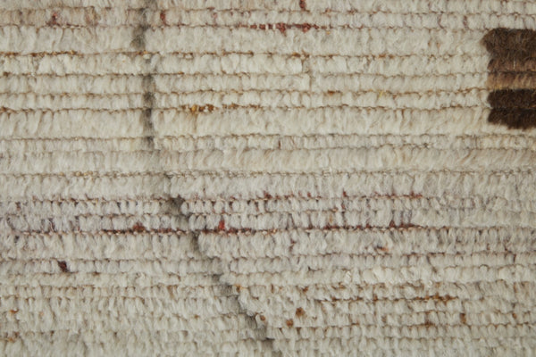 HomeRoots 6' X 9' Ivory and Tan Hand-Knotted Wool Moroccan Area Rug - Timeless Elegance for Any Space! 567289