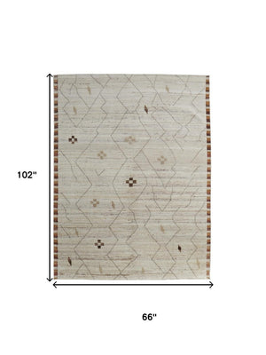 HomeRoots 6' X 9' Ivory and Tan Hand-Knotted Wool Moroccan Area Rug - Timeless Elegance for Any Space! 567289