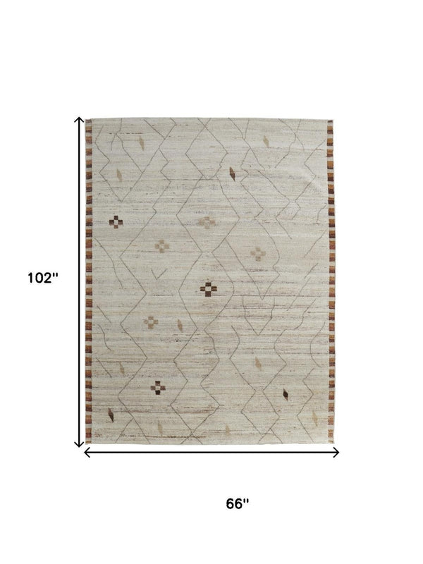 HomeRoots 6' X 9' Ivory and Tan Hand-Knotted Wool Moroccan Area Rug - Timeless Elegance for Any Space! 567289