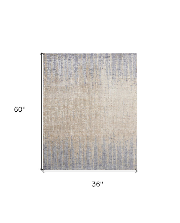 Homeroots 3' X 5' Ivory Tan And Blue Ombre Power Loom Worn Faded Area Rug Gray Polyester 567315