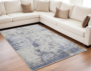 HomeRoots 5' Modern Abstract Area Rug in Ivory, Gray, and Blue - Durable, Stain-Resistant, and Elegant Design 5' X 8' 567318