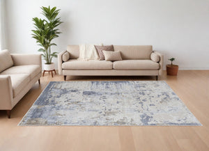 HomeRoots 5' Modern Abstract Area Rug in Ivory, Gray, and Blue - Durable, Stain-Resistant, and Elegant Design 8' X 10' 567319