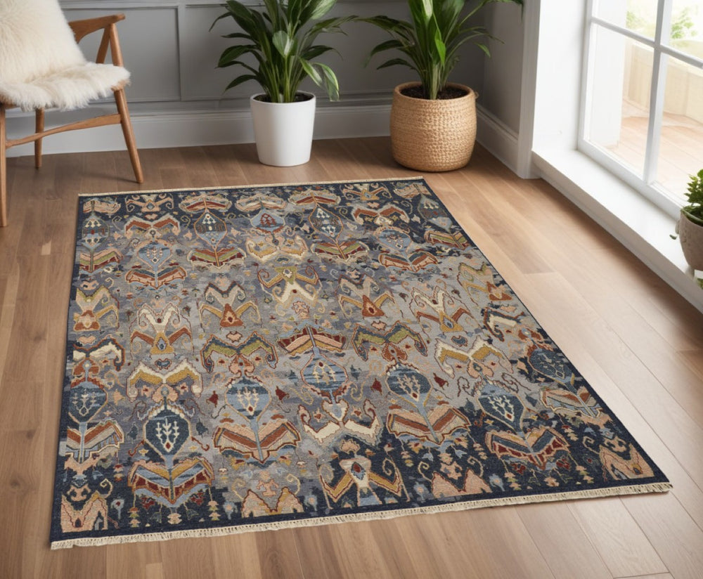 HomeRoots 4' Hand-Knotted Wool Ikat Area Rug in Blue-Gray and Brown – Timeless Charm for Any Room 4' X 6' 567335