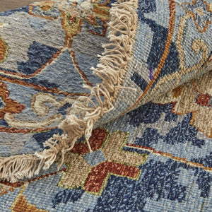 HomeRoots 4' Hand-Knotted Wool Floral Area Rug in Blue Gray and Red with Fringe - Timeless Elegance for Any Room 4' X 6' 567361