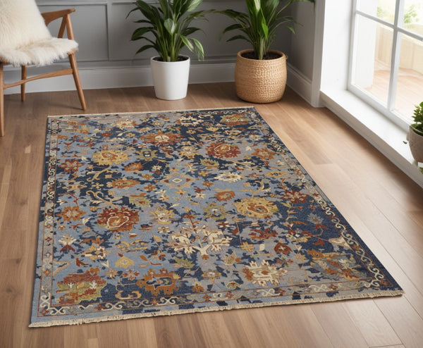HomeRoots 4' Hand-Knotted Wool Floral Area Rug in Blue Gray and Red with Fringe - Timeless Elegance for Any Room 4' X 6' 567361