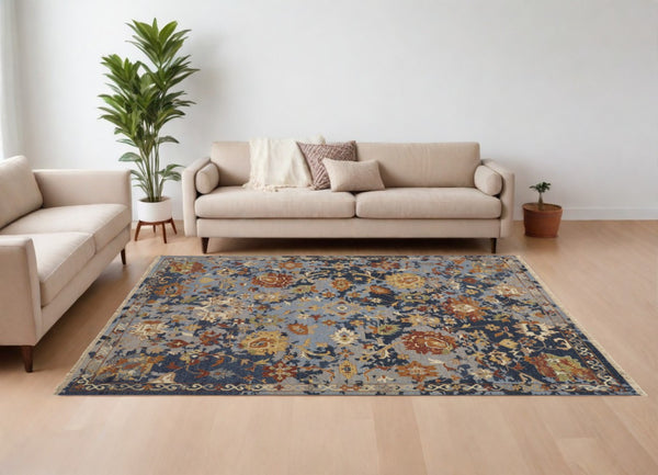 HomeRoots 4' Hand-Knotted Wool Floral Area Rug in Blue Gray and Red with Fringe - Timeless Elegance for Any Room 6' X 9' 567362