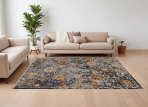 HomeRoots 4' Hand-Knotted Wool Floral Area Rug in Blue Gray and Red with Fringe - Timeless Elegance for Any Room 8' X 10' 567363