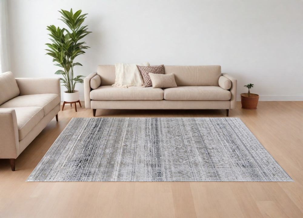 Homeroots 9' X 12' Black And Gray Abstract Power Loom Worn Faded Area Rug Taupe Polyester 567371