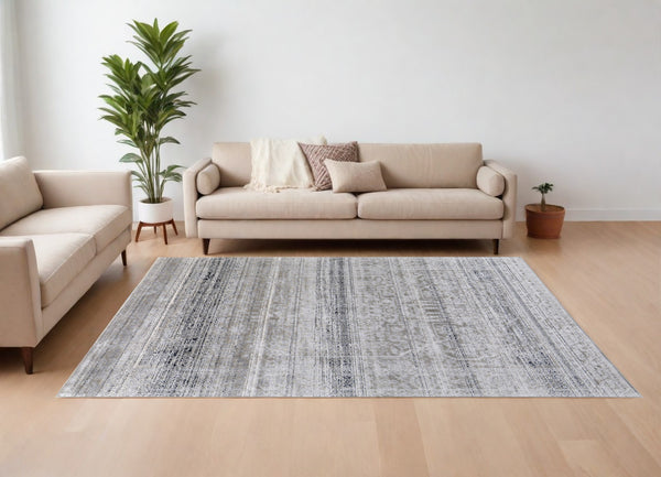 Homeroots 10' X 13' Black And Gray Abstract Power Loom Worn Faded Area Rug Taupe Polyester 567372