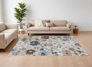 HomeRoots 5' Elegant Ivory Red and Blue Floral Area Rug - Timeless Power Loom Design for Stylish Homes 8' X 10' 567397