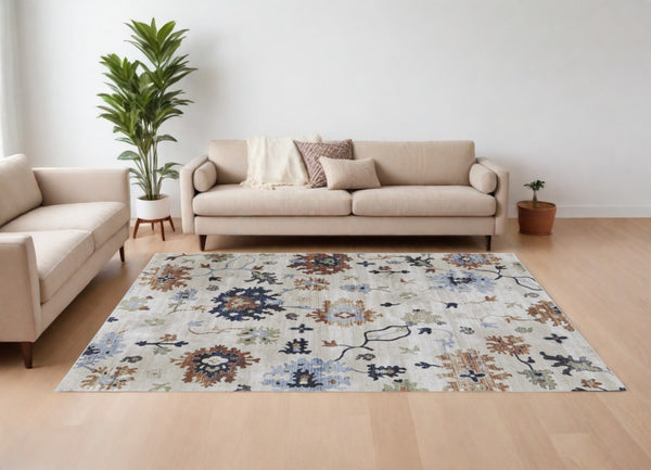 HomeRoots 5' Elegant Ivory Red and Blue Floral Area Rug - Timeless Power Loom Design for Stylish Homes 9' X 13' 567398