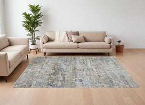 HomeRoots 5' Ivory Green and Blue Floral Area Rug – Durable, Power-Loomed Design for Elegant Living Spaces 7' X 10' 567406