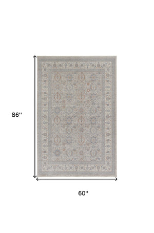 Homeroots 5' X 7' Silver Taupe And Blue Oriental Power Loom Worn Faded Area Rug With Fringe Taupe Polyester 567421