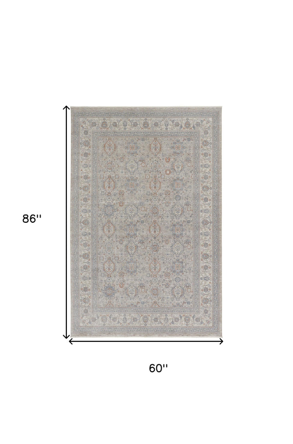 Homeroots 5' X 7' Silver Taupe And Blue Oriental Power Loom Worn Faded Area Rug With Fringe Taupe Polyester 567421