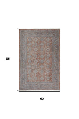 Homeroots 5' X 7' Blue And Red Oriental Power Loom Worn Faded Area Rug With Fringe Red Polyester 567431