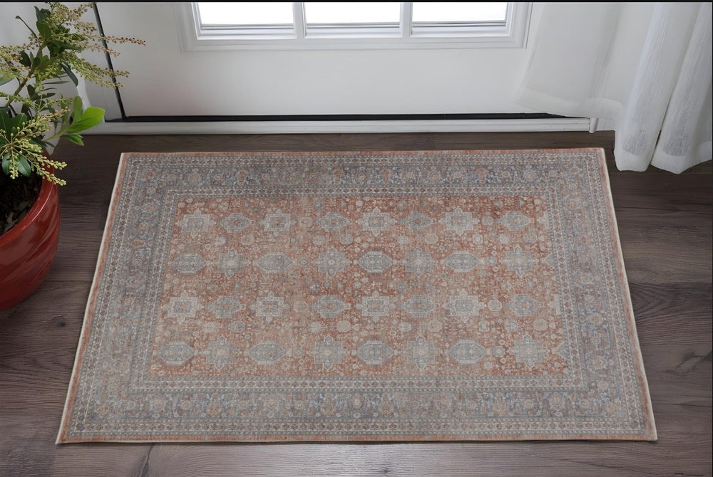 HomeRoots 4' Silver Taupe and Blue Vintage-Inspired Oriental Area Rug with Classic Tassel Fringe Charm 2' X 3' 567439