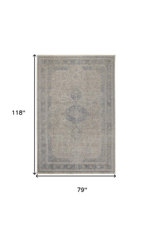 HomeRoots 4' Timeless Gray-Blue and Taupe Oriental Area Rug with Classic Fringed Tassels for Elegant Spaces 7' X 10' 567442