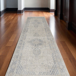 Homeroots 12' Gray Blue And Taupe Oriental Power Loom Worn Faded Runner Rug With Fringe Taupe Polyester 567447