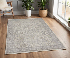 Homeroots 4' X 5' Gray And Ivory Oriental Power Loom Worn Faded Area Rug With Fringe Gray Polyester 567450