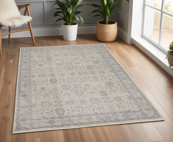 Homeroots 4' X 5' Gray And Ivory Oriental Power Loom Worn Faded Area Rug With Fringe Gray Polyester 567450