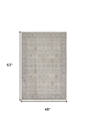 Homeroots 4' X 5' Gray And Ivory Oriental Power Loom Worn Faded Area Rug With Fringe Gray Polyester 567450
