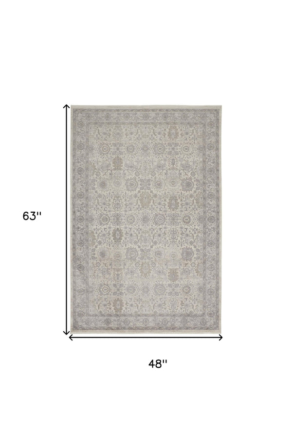 Homeroots 4' X 5' Gray And Ivory Oriental Power Loom Worn Faded Area Rug With Fringe Gray Polyester 567450