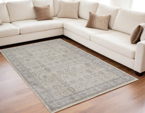 HomeRoots 4' Gray and Ivory Oriental Area Rug with Vintage Faded Design, Durable Power Loom Construction 5' X 7' 567451