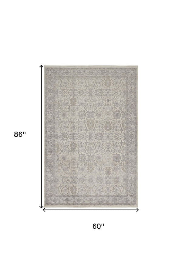 Homeroots 5' X 7' Gray And Ivory Oriental Power Loom Worn Faded Area Rug With Fringe Gray Polyester 567451