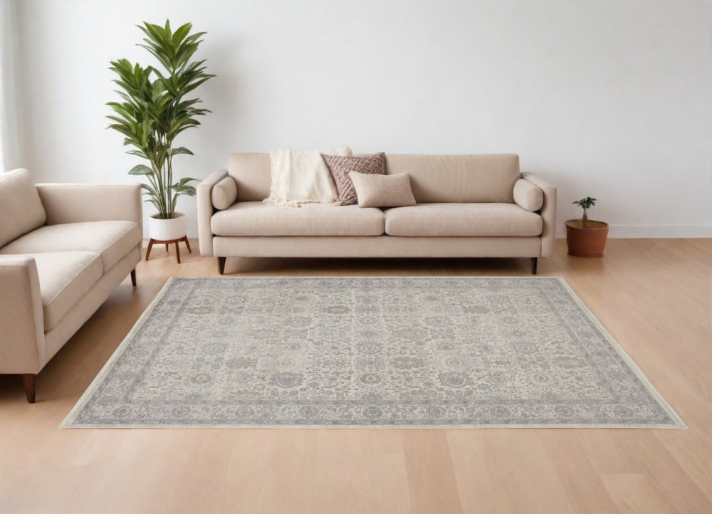 HomeRoots 4' Gray and Ivory Oriental Area Rug with Vintage Faded Design, Durable Power Loom Construction 8' X 10' 567453