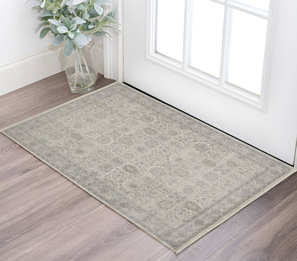 Homeroots 2' X 3' Gray And Ivory Oriental Power Loom Worn Faded Area Rug With Fringe Gray Polyester 567459