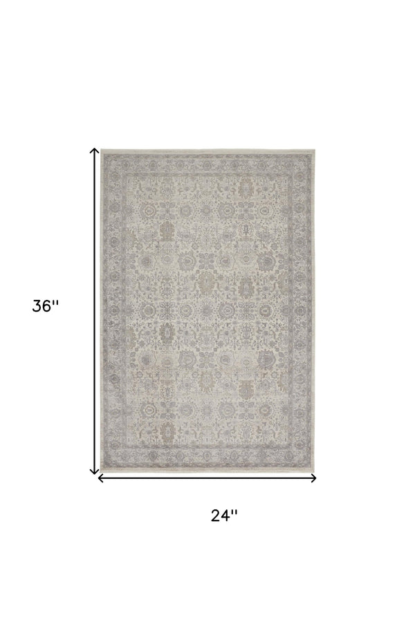 Homeroots 2' X 3' Gray And Ivory Oriental Power Loom Worn Faded Area Rug With Fringe Gray Polyester 567459