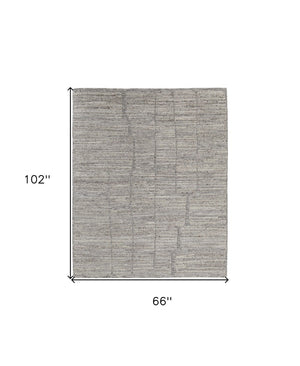HomeRoots 4' Hand Woven Taupe and Gray Abstract Area Rug - Cozy Scandinavian Design with Unique Artisan Flair 6' X 9' 567481