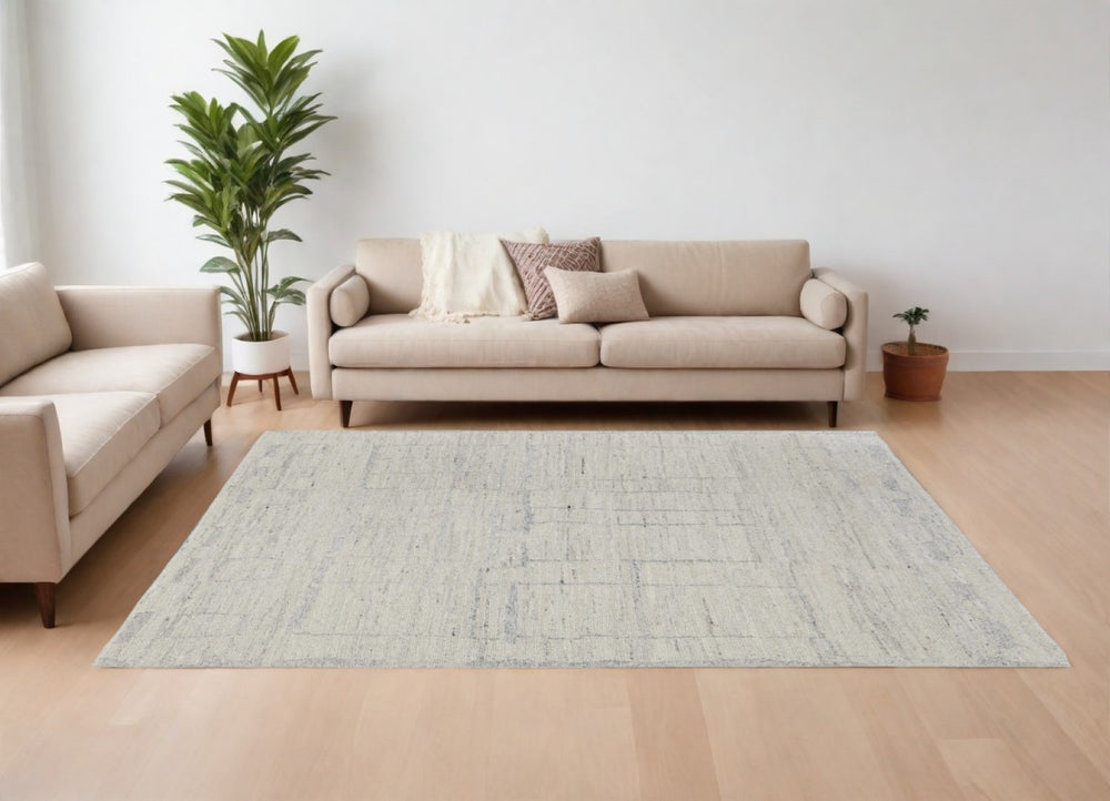 HomeRoots 4' Gray and Ivory Abstract Hand-Woven Area Rug - Soft Wool Blend for Modern, Scandinavian Style 6' X 9' 567488