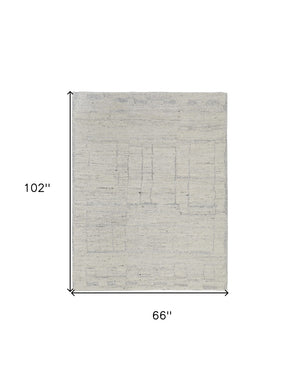 HomeRoots 4' Gray and Ivory Abstract Hand-Woven Area Rug - Soft Wool Blend for Modern, Scandinavian Style 6' X 9' 567488