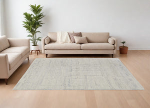 HomeRoots 4' Gray and Ivory Abstract Hand-Woven Area Rug - Soft Wool Blend for Modern, Scandinavian Style 8' X 12' 567490