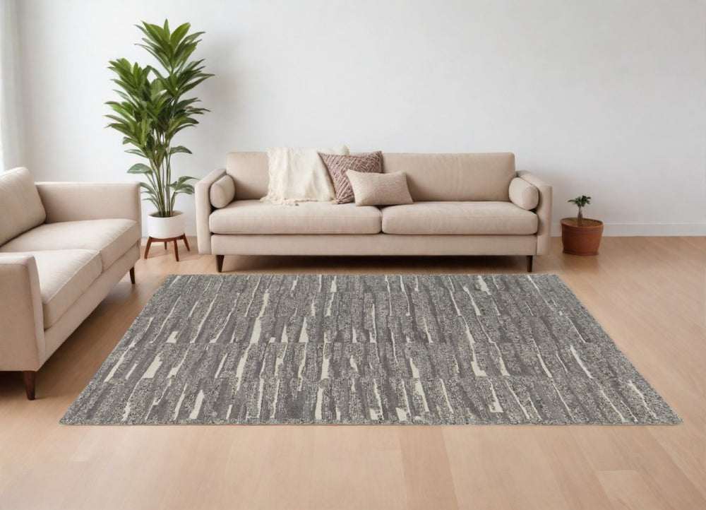 HomeRoots 4' Hand Woven Area Rug in Gray, Ivory & Taupe - Modern Abstract Design for Stylish Interiors 6' X 9' 567495