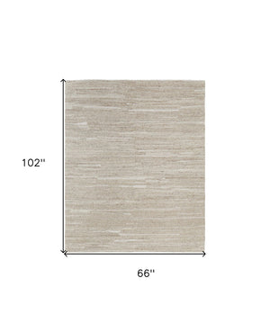 HomeRoots 4' Elegant Ivory Hand-Woven Abstract Area Rug for Modern and Traditional Spaces, 100% Wool Blend 6' X 9' 567509