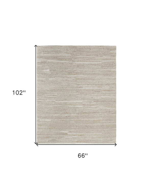 HomeRoots 4' Elegant Ivory Hand-Woven Abstract Area Rug for Modern and Traditional Spaces, 100% Wool Blend 6' X 9' 567509